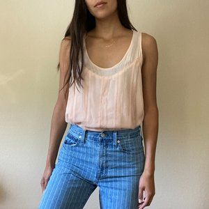 Light pink sleeveless blouse